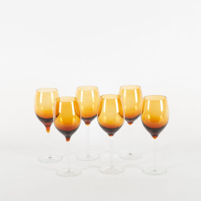 A Set Of Six Amber Glass Handblown Wine Glasses