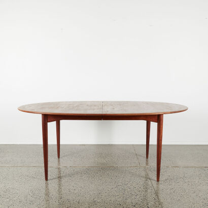 A Mid Century Oval Extendable Table