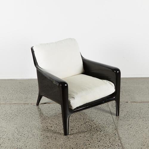 An Arflex Cocca Black Armchair