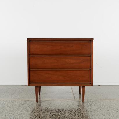 A Paul McCobb Style Mid-Century Walnut Three Drawer