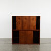 A Pair Of Rosewood Cabinets With Sliding Doors