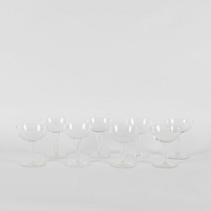A Set Of Eight Hollow Stem Champagne Coupes