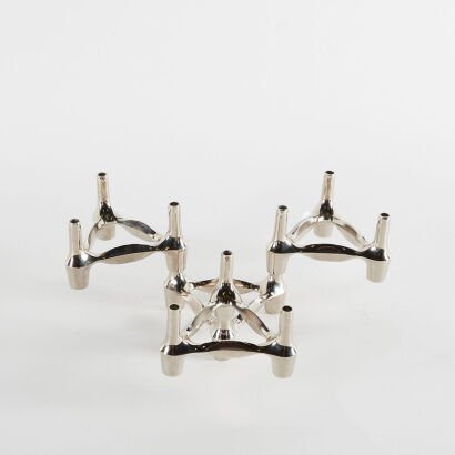 A Set Of Four Nagel Mid-Century Stacking Silver Chrome Candle Holders