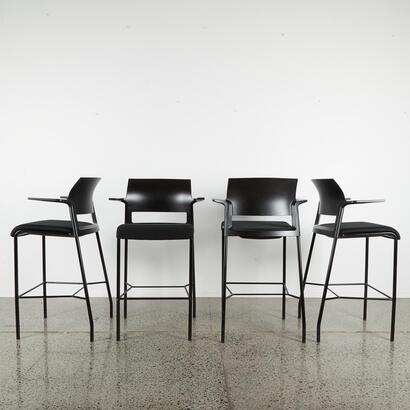 A Set Of Four Black Designer Barstools