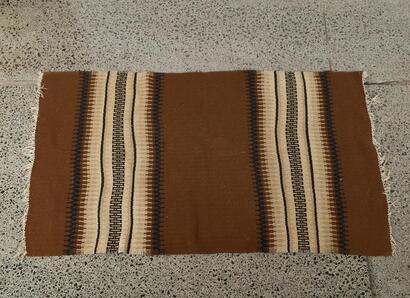 A Mid Century Hand Woven Wool Rug