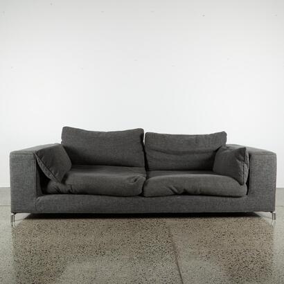 A Contemporary 2.5 Seater Couch In Textured Grey Fabric
