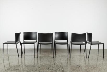 A Set Of Six Minimal Black Designer Chairs