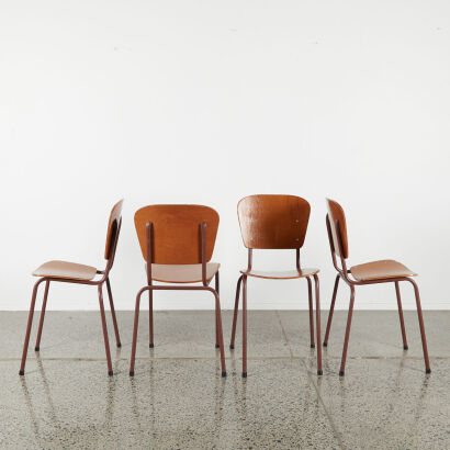 A Set Of Four Vintage Ply Stacker Chairs