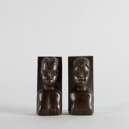 A Pair Of Carved Statues