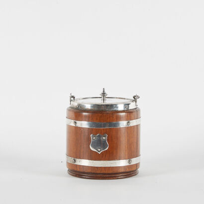 A Wooden Ice Bucket With Silver Plated Lid And Trim