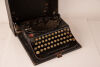 A Vintage Remington Portable Typewriter in Black - 2