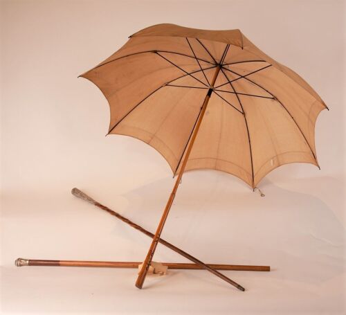 Two Walking Sticks with Indian Silver Mounts and a Parasol