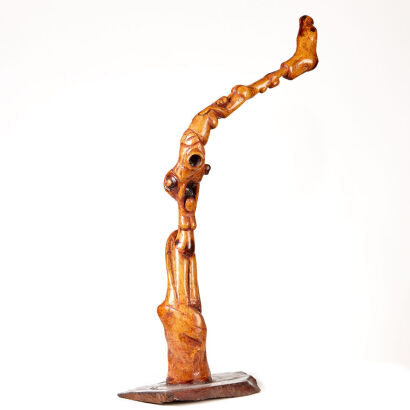 A Hand-Carved Figural Sculpture