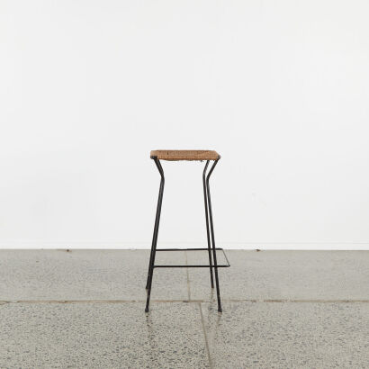 A Mid-Century Black Metal And Cord Bar Stool