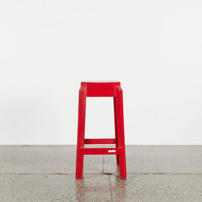 A Red Plastic Moulded Bar Stool