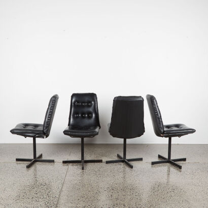A Set Of Four Mid-Century Dining Chairs