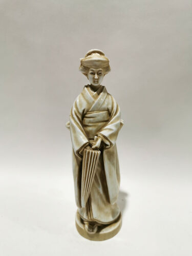 A Japanese Porcelain Carving of Lady