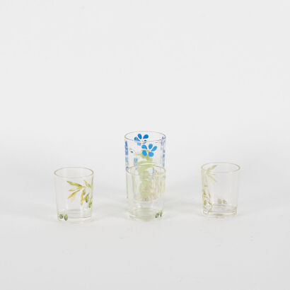 A Collection Of Four Floral Shot Glasses