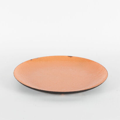 An Orange Enamel Charger Plate