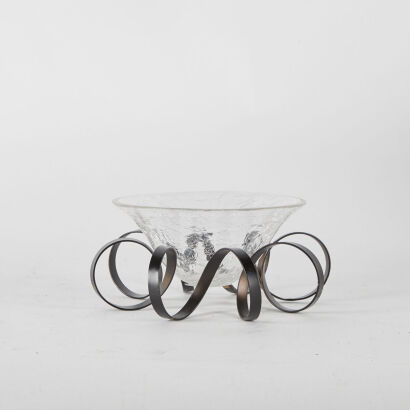 A Glass Dish On Curled Metal Base