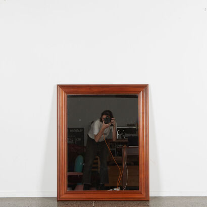 A Wooden Framed Mirror