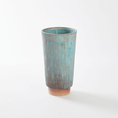 A Teal and Orange Ceramic Vase