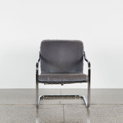 A Chrome And Grey Cantilever Chair