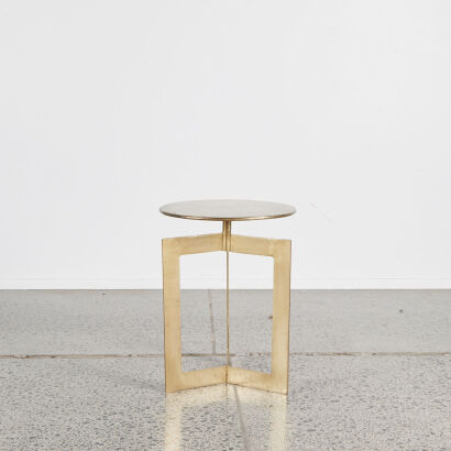 A Gold Three Legged Side Table