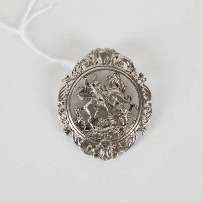 A Metal Saint George Brooch