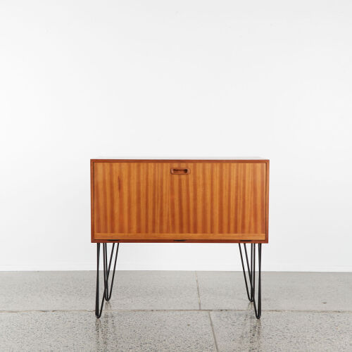 A Mid Century Storage Cabinet With Hairpin Legs