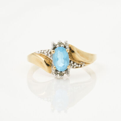 10ct Yellow Gold, .33ct Oval Blue Topaz and Diamond Ring