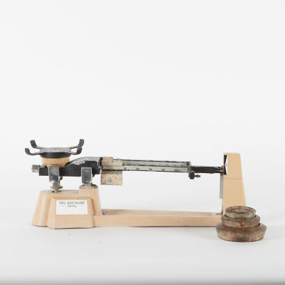 A Triple Beam Balance Scales