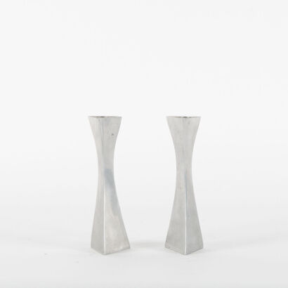 A Cast Aluminium Decorative Candle Holders