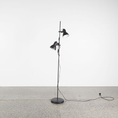 A Black Floor Lamp With Two Adjustable Heads