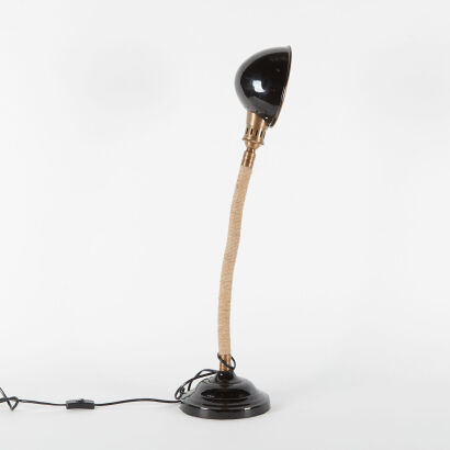 A Desktop Lamp With Hesian Rope Stem And Black Metal Base And Shade