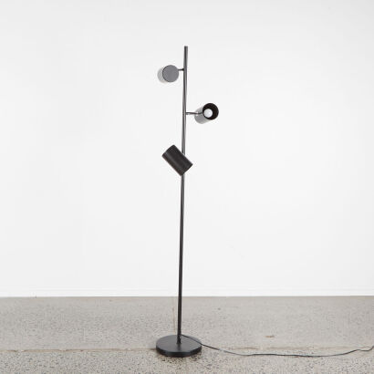 A Black Floor Lamp With Adjustable Trio Heads