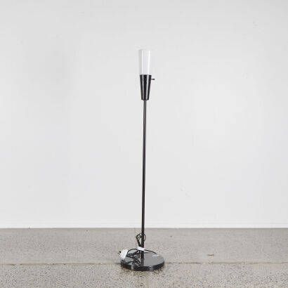 A Designer Floor Lamp With Marble Base