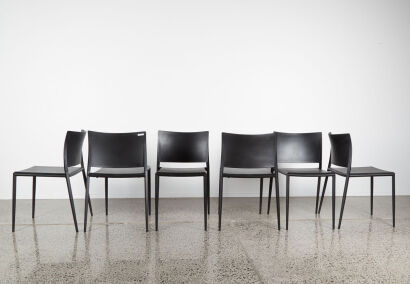 A Suit Of Six Black Designer Dining Chairs