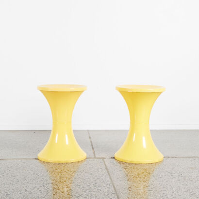 A Pair Of Plastic Yellow Retro Stools