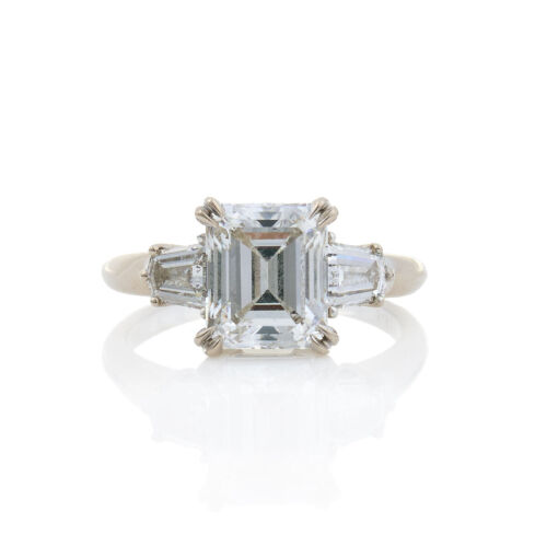 18ct White Gold, Three Stone Ring, with a 3.02ct E Colour, IF Flawless Emerald Cut Diamond Centre