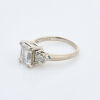 18ct White Gold, Three Stone Ring, with a 3.02ct E Colour, IF Flawless Emerald Cut Diamond Centre - 2