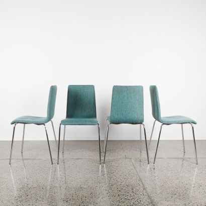 A Set Of Four Dining Chairs In Teal Upholstery With Chrome Frame