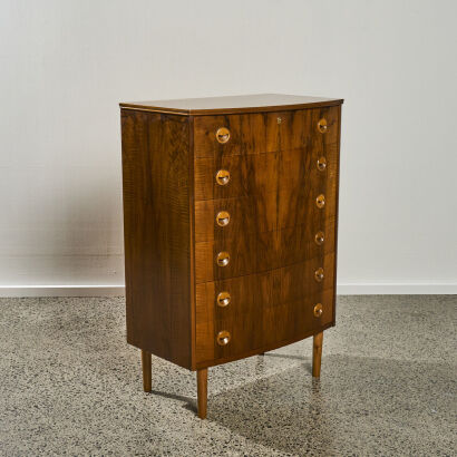 A Danish Walnut Bow-Front Chest