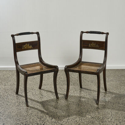 A Pair of Regency Sabre Leg Chairs