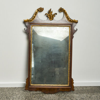 A George II Walnut and Gilt Mirror