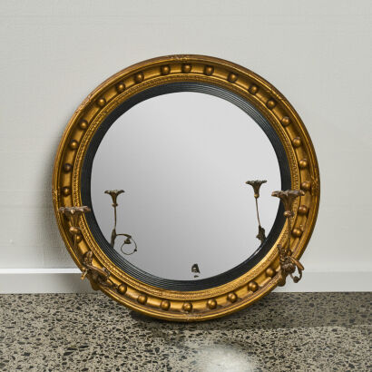 An English Regency Giltwood Convex Mirror