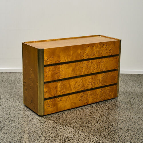 A Bird's-Eye Maple and Brass Chest of Drawers