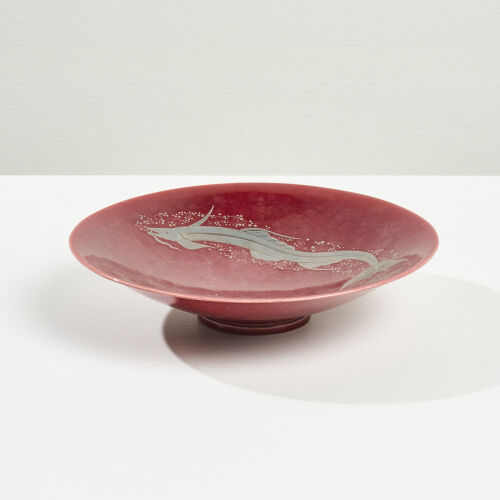 A Wilhelm Kage Red Ceramic Plate with Silver Inlay