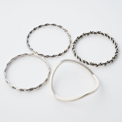 Four Assorted Silver Bangles