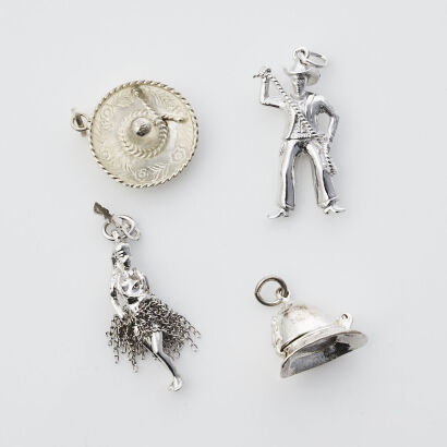 Four Assorted Silver Charms